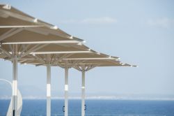 Indus parasol on a terrace overlooking the sea